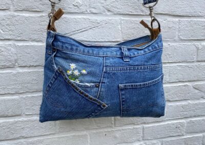 embroidered daisy on jeans